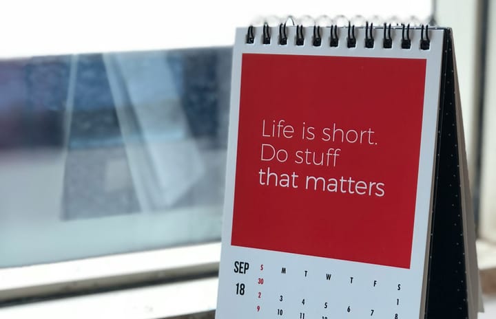 A desktop calendar with the inspirational phrase "Life is short. Do stuff that matters".